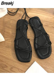 Women Summer New 2023 Beach Fashion Sexy Flat Casual Cross-Tie Open Toe Fairy Style Narrow Band Shoes Black Rome