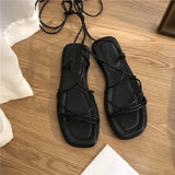 Womens Summer New 2023 Beach Fashion Sexy Flat Casual Cross Tie Open Toe Dress Fairy Black Roman Sandals Womens