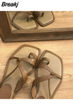 Women Summer New 2023 Beach Fashion Sexy Flat Casual Cross-Tie Open Toe Fairy Style Narrow Band Shoes Black Rome