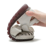 Summer New Head Layer Cowhide Flat Bottom Women's Shoes National Wind Leather Hollow Out Small Flower Women's Sandals Mother